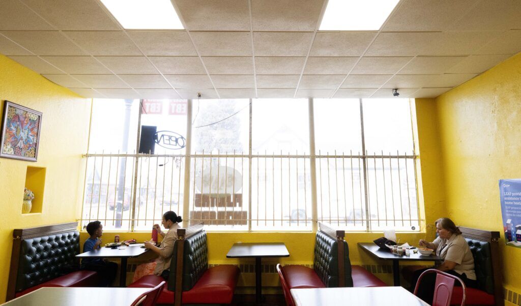Customers eat inside Panadería Emmanuel in the Globeville neighborhood of Denver on Tuesday, Feb. 24, 2026. The Mexican bakery supports the neighborhood and the neighborhood supports it. Community clubs and groups use the bakery for meetings and owners Daniel and Julia Casillas keeps tabs for people in need of food. The neighborhood, in return, supported the bakery during the COVID-19 pandemic. (The Gazette, Christian Murdock)
