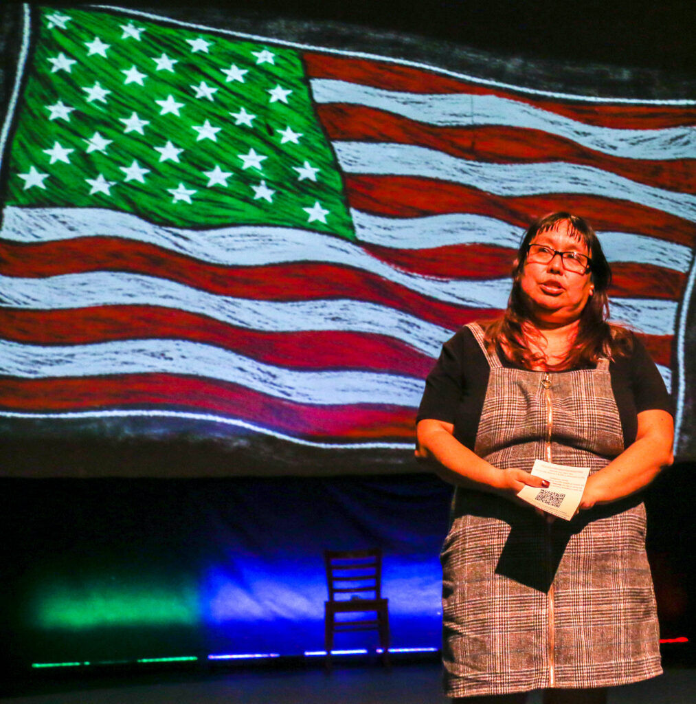 Co-director Micaela Garcia de Benevidez speaks before a performance of 'Just Like Us' at Su Teatro on March 19, 2026. (John Moore/The Denver Gazette)