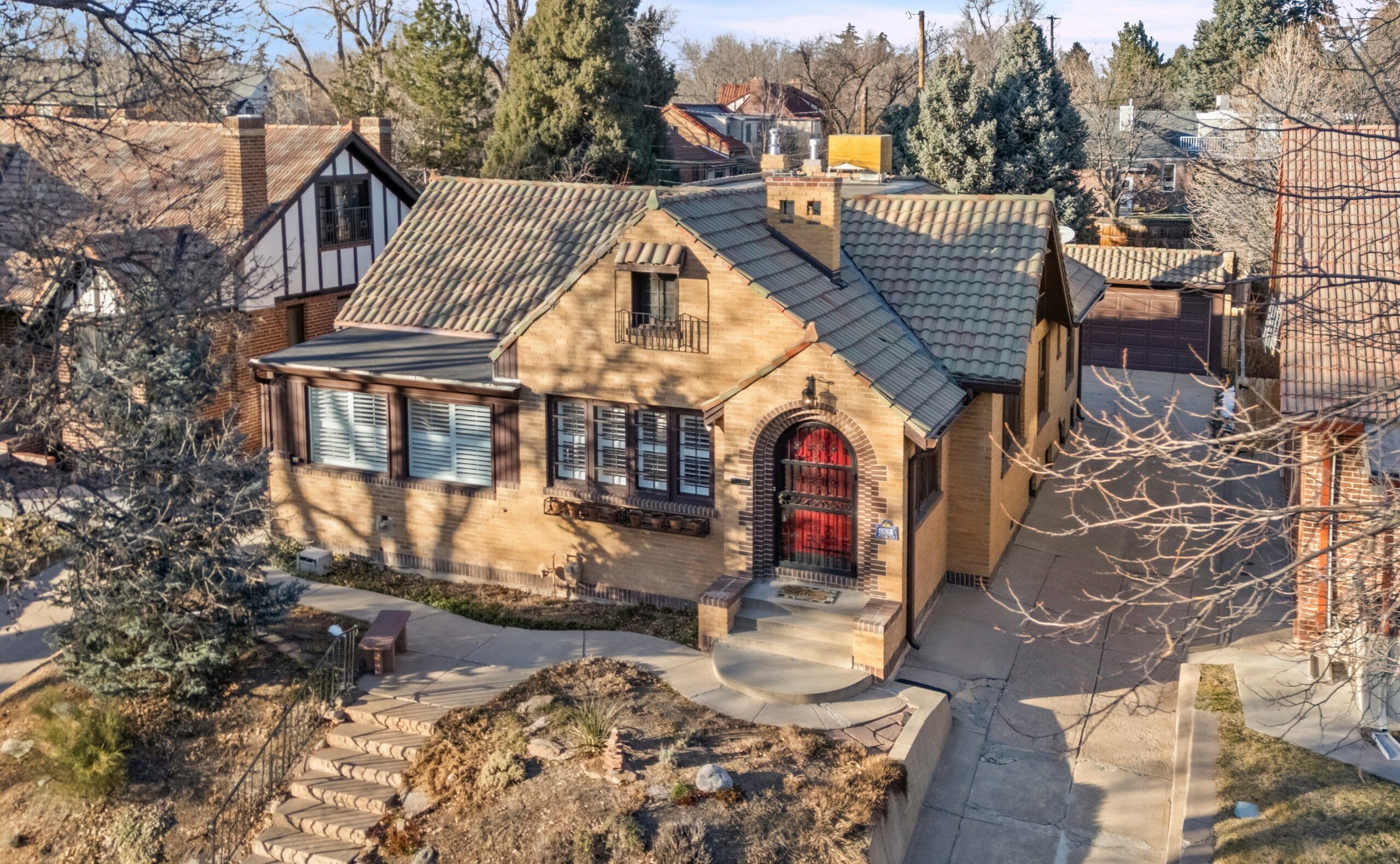 Four blocks from City Park, Tudor ranch has entertaining possibilities