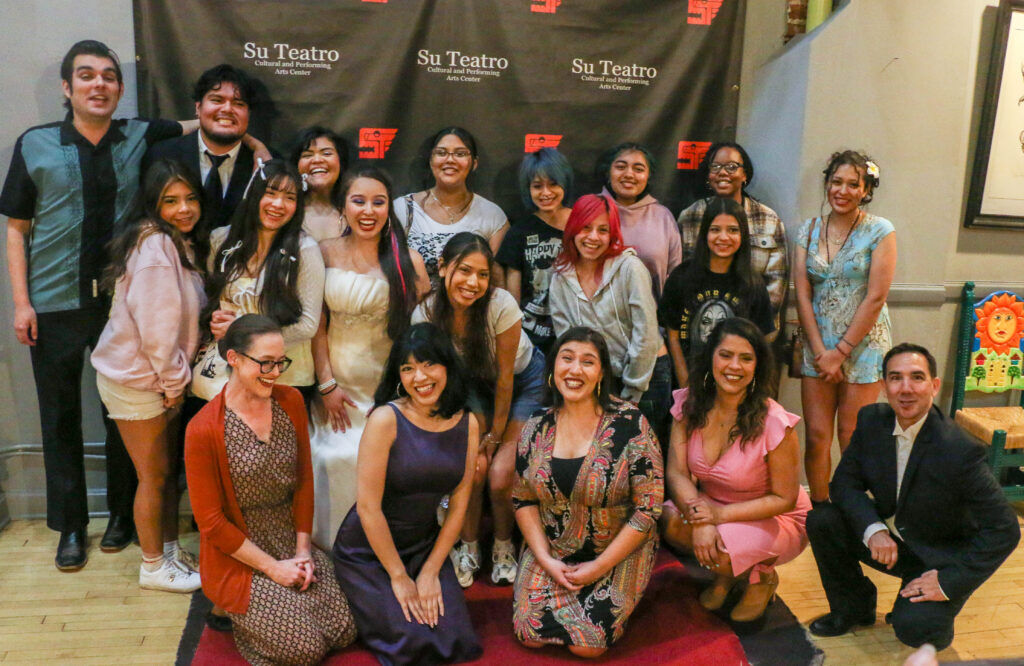 The cast gathers in the lobby to pose with student audience members at their performance of 'Just Like Us' at Su Teatro on March 19, 2026. (John Moore/The Denver Gazette)
