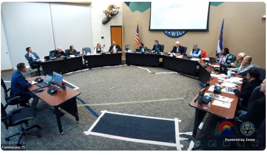 The Gazette file This screenshot shows a Colorado Parks and Wildlife Commission meeting where criticism of the wolf release was brought forward by commissioners and stakeholders.