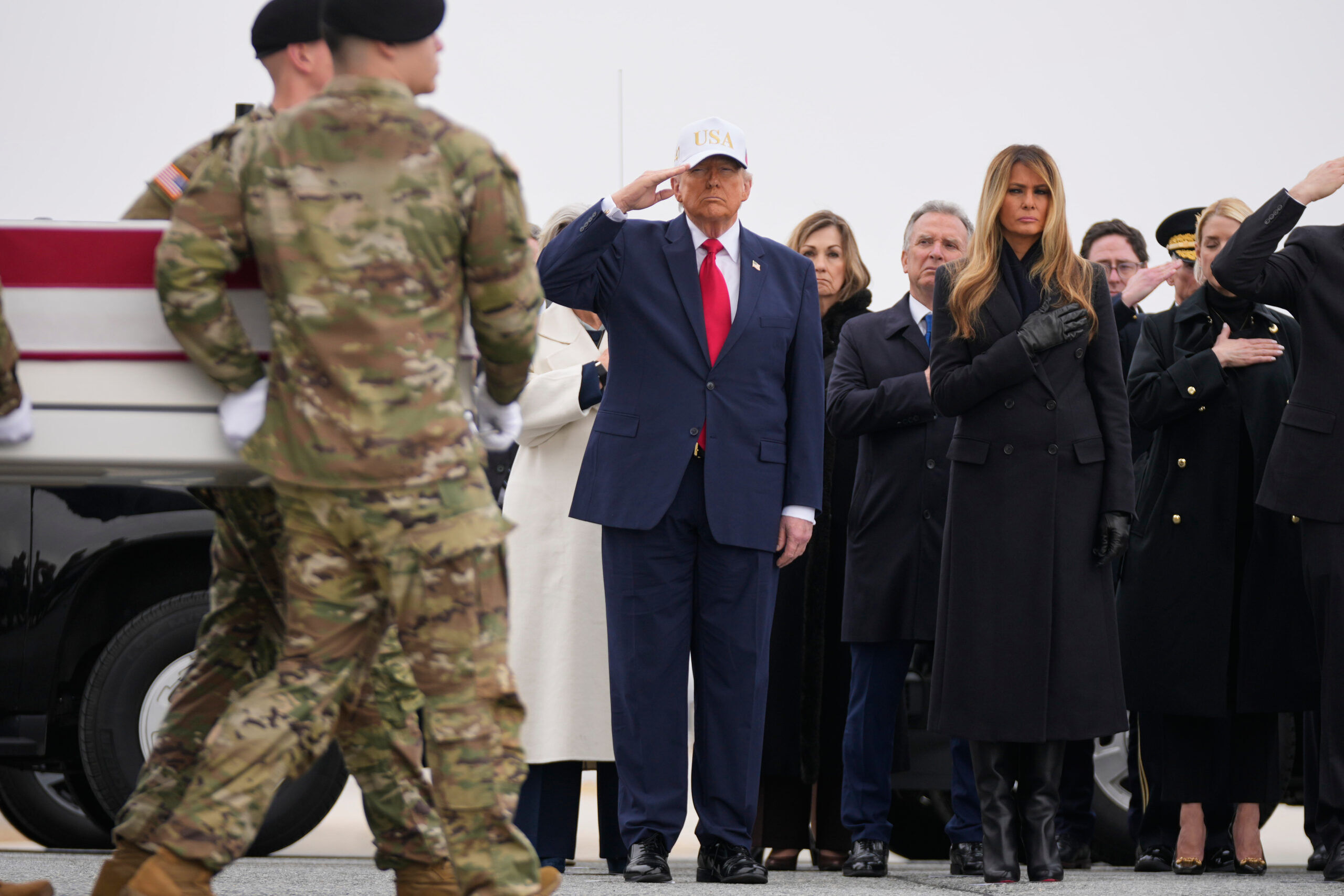 Trump grieves with families during return of soldiers