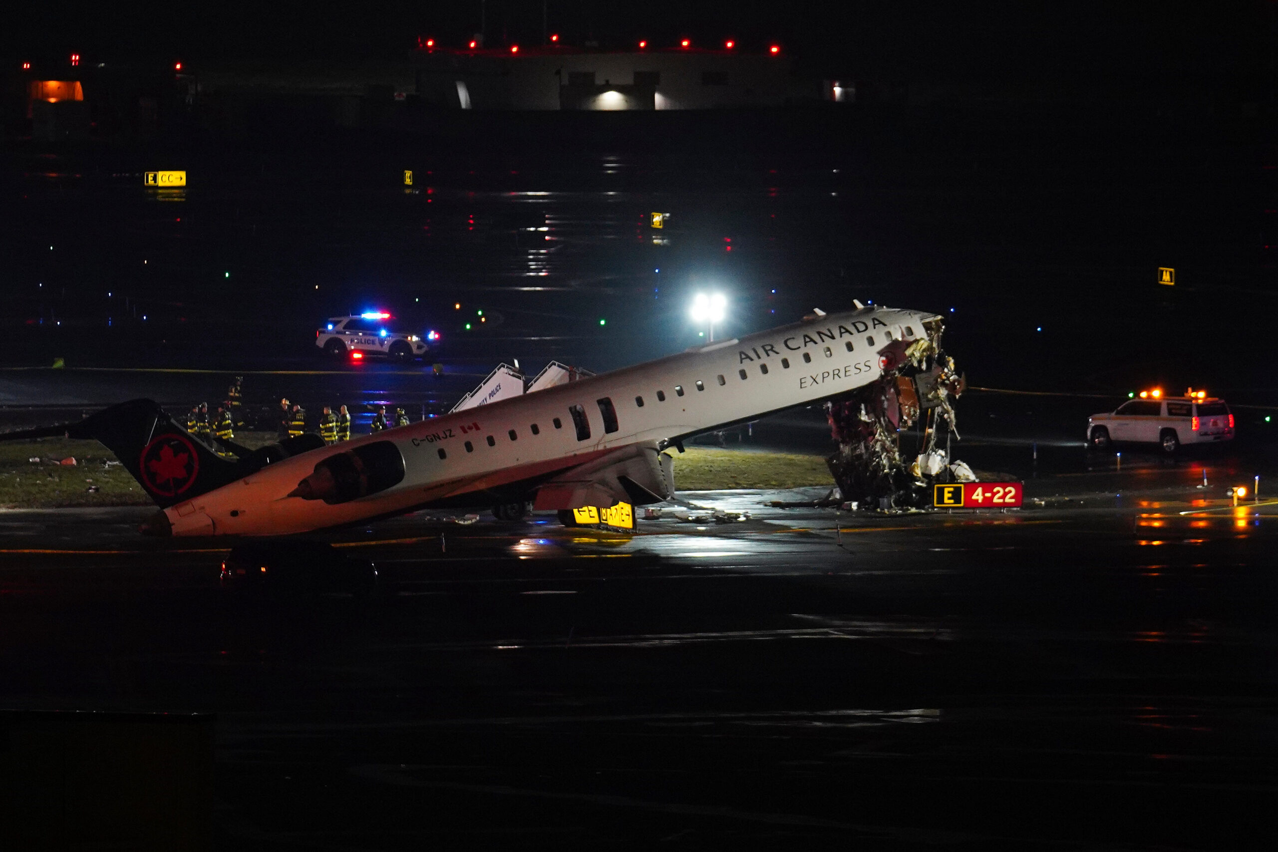Pilot and copilot killed in collision between jet and fire truck at New York’s LaGuardia Airport