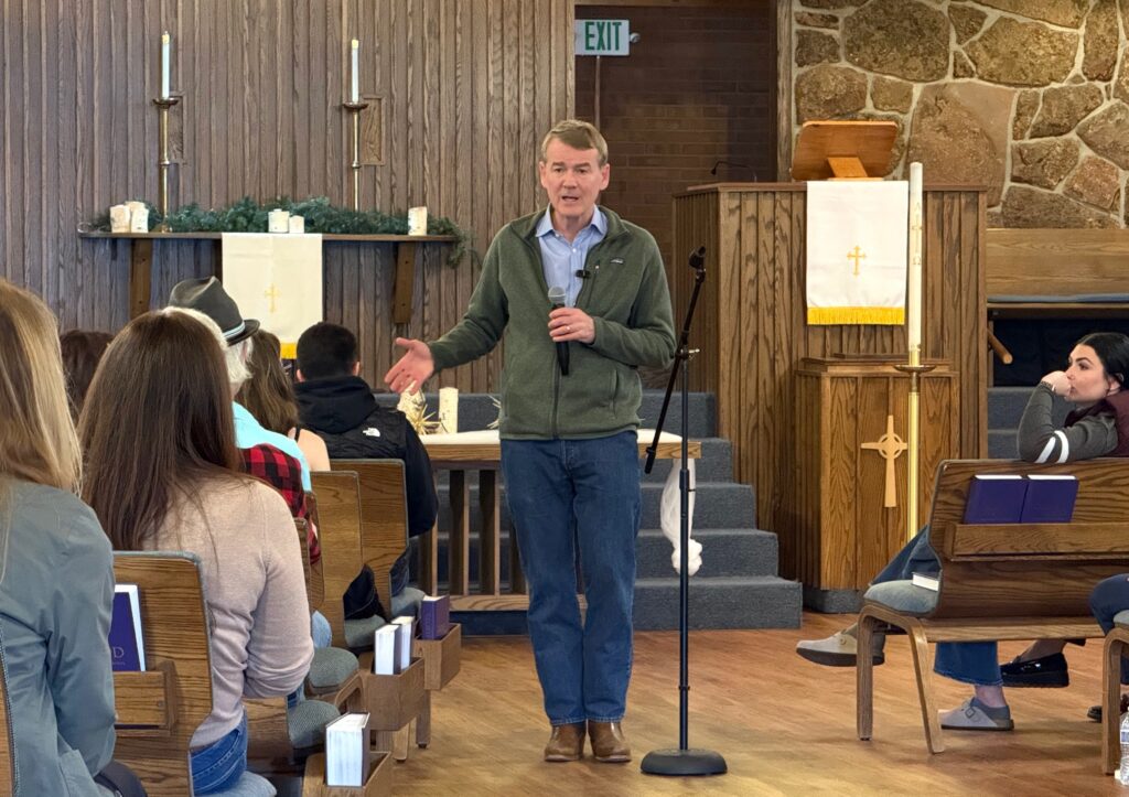 U.S. Sen. Michael Bennet, a Democratic gubernatorial candidate in Colorado, speaks at a campaign town hall on Feb. 7, 2026, at Good Shepherd Presbyterian Church in Northglenn. (Ernest Luning/Colorado Politics)
