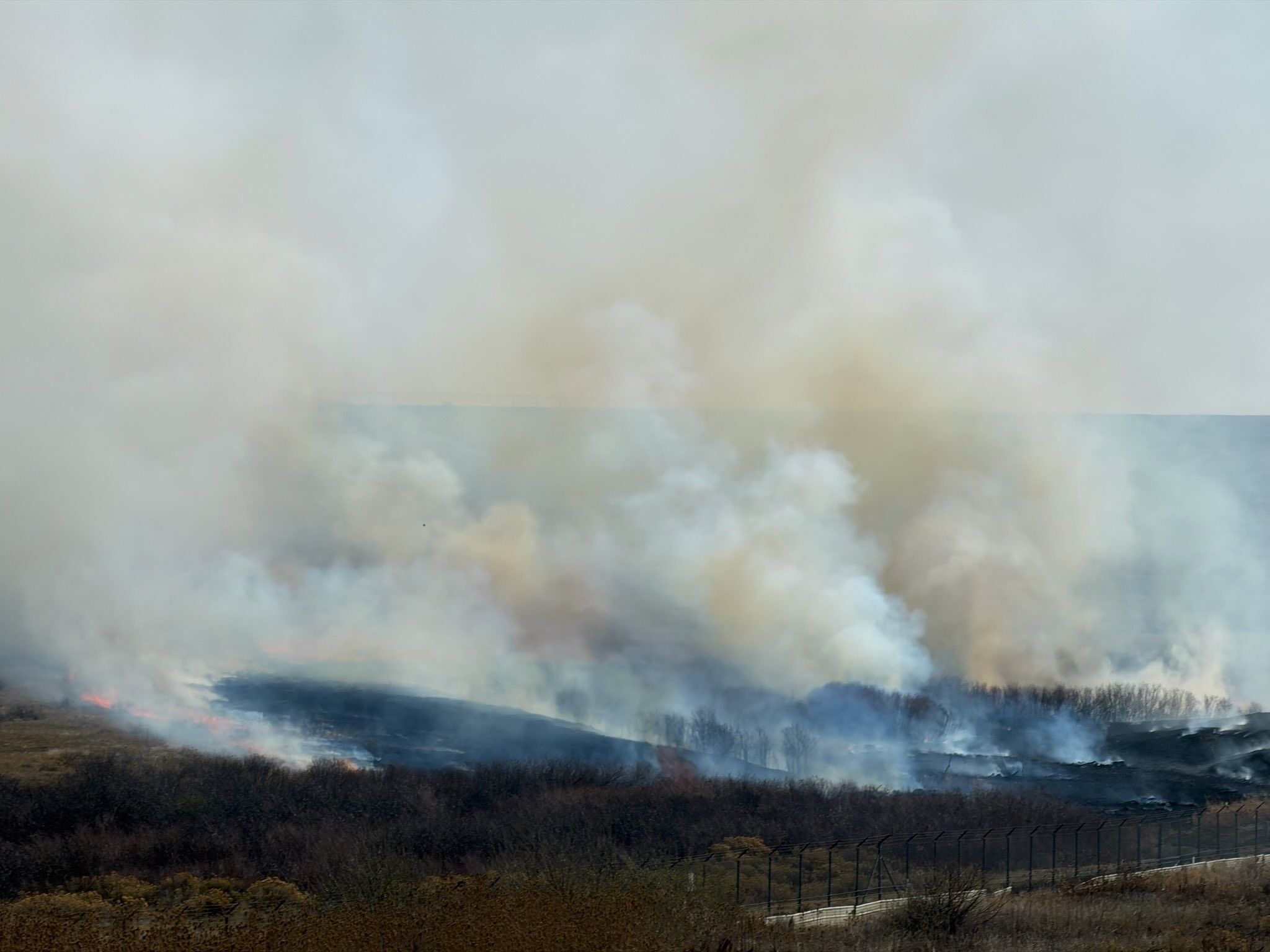Aurora wildland fire contained at Buckley Space Force Base