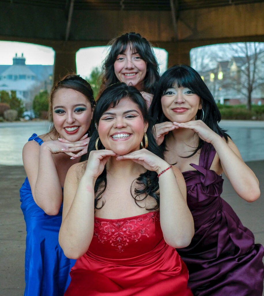 The cast of Su Teatro's current production of 'Just Like Us' in March 2026. Clockwise from left: Kiara Plaza, Lucinda Lazo, Shyan Rivera and Gisselle Gonzalez. While the photo was taken at the original Elitch Gardens, the play is being staged at 721 Santa Fe Drive. (Juan Fuentes)