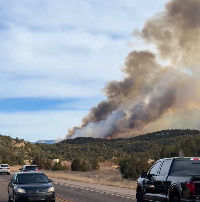 Highway closed as flames and smoke spout from new wildfire burning in Colorado
