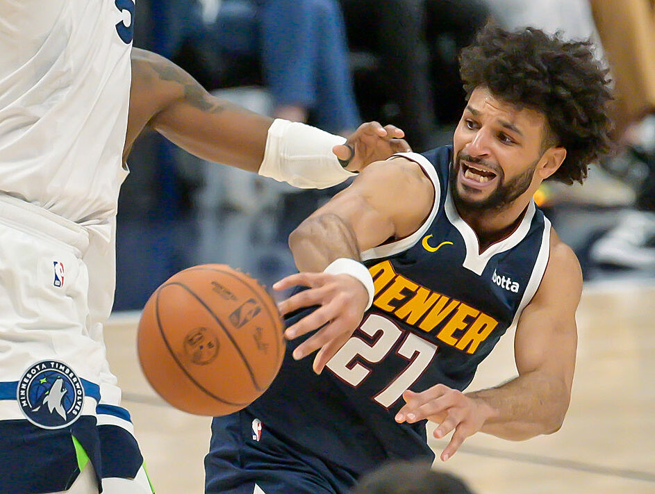 Denver Nuggets guard Jamal Murray (27) passes the ball in game 5 against the Timberwolves at Ball Arena on Monday, April 28, 2026. The Nuggets defeated the Timberwolves 125-113. (The Gazette, Jerilee Bennett)