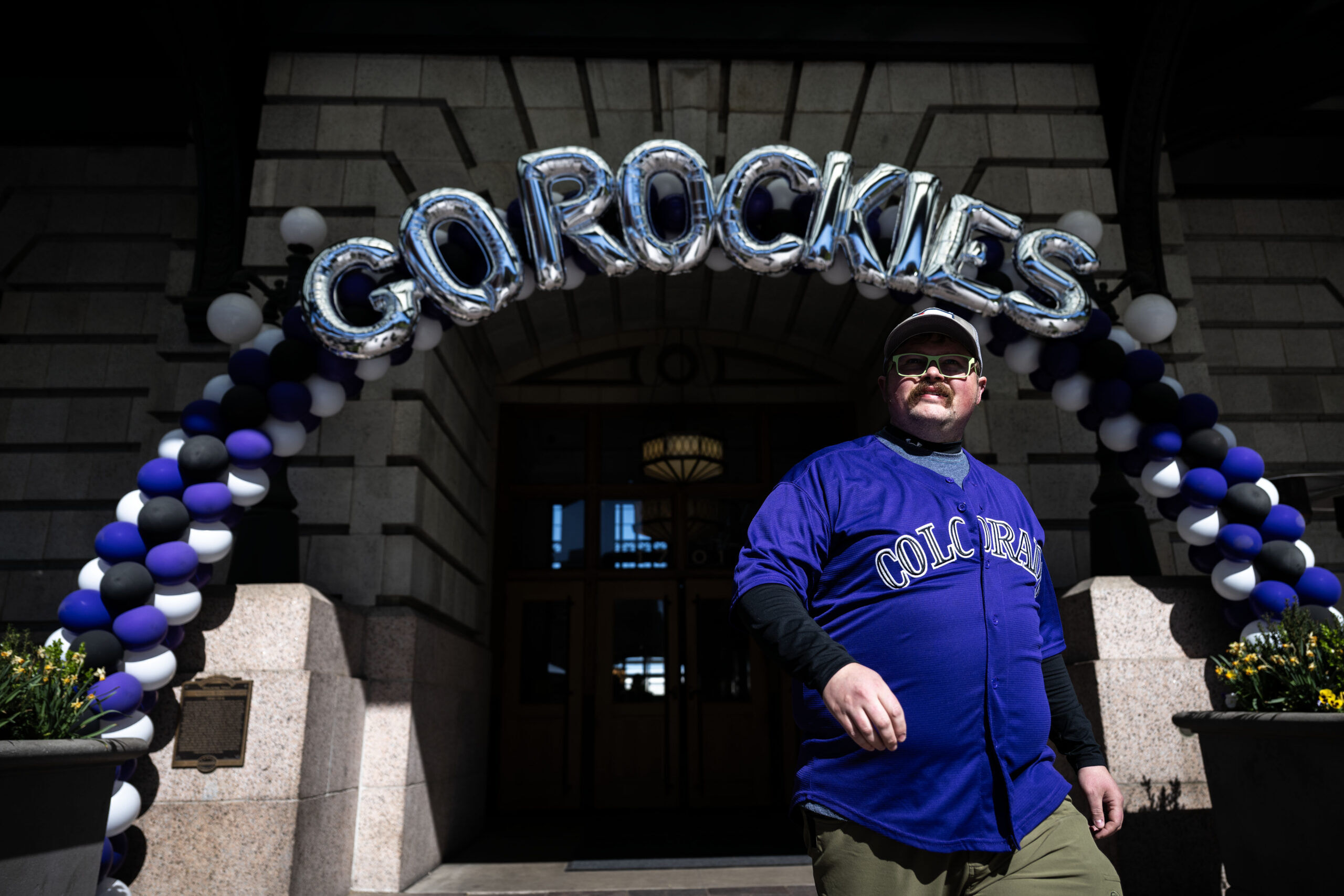 Downtown Denver awash with purple for Rockies Opening Day
