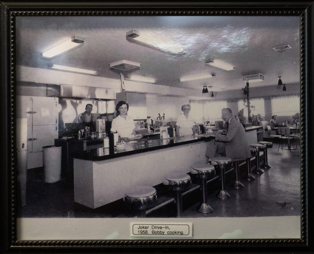 A picture of Joker Drive-In where Greg DiRito's dad, Bob Dirito, sold Cañon City's first pizza is pictured on the wall in DiRito's Italian Restaurant on Wednesday, April 8, 2026. (The Gazette, Christian Murdock)