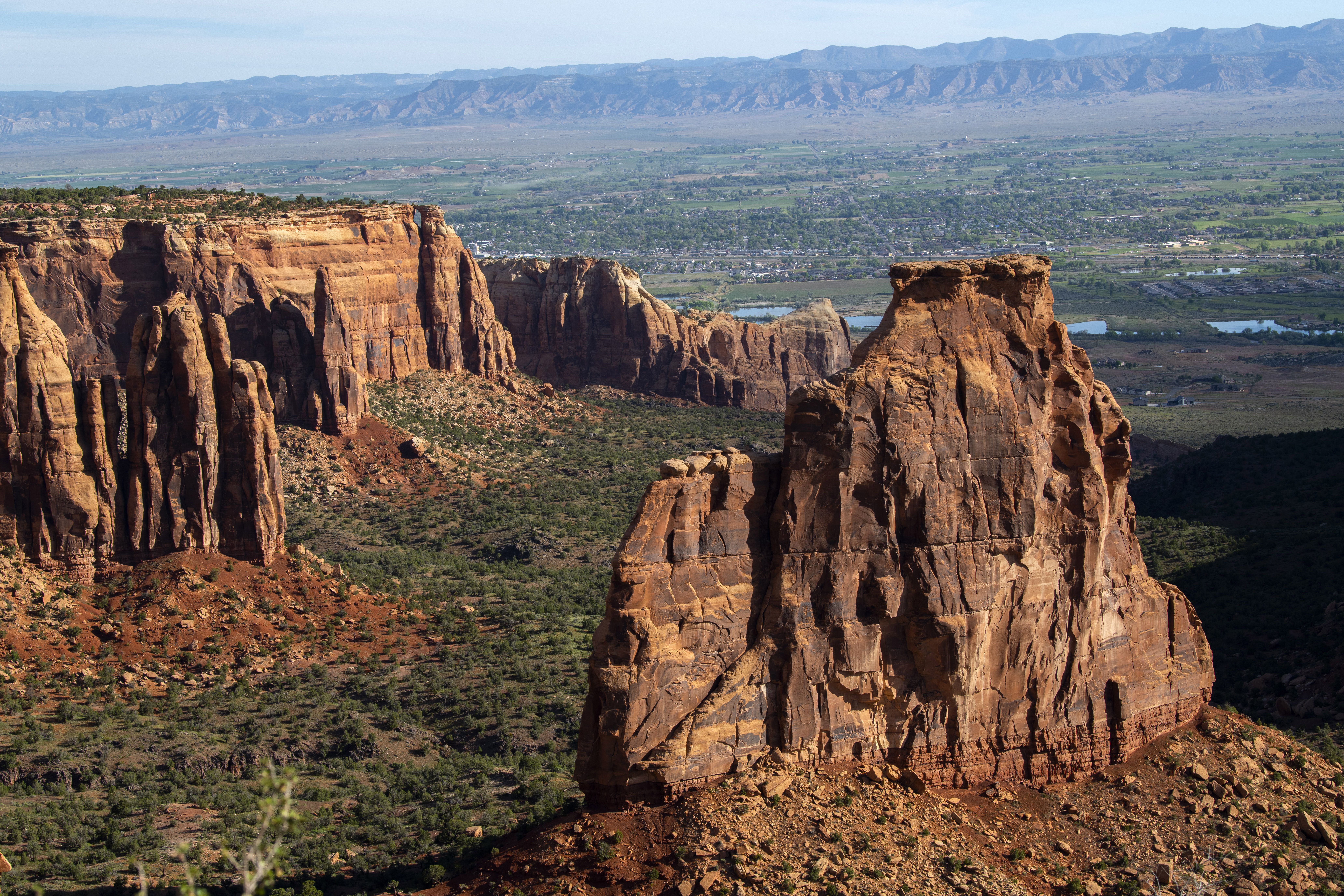 The Bookcliffs and the town of Fruita can be seen from the rim of the Colorado National Monument. Christian Murdock, The Gazette