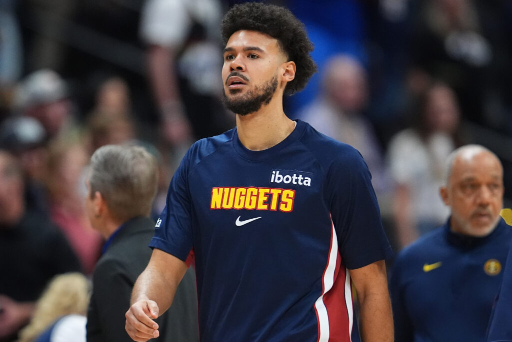Denver Nuggets forward Cameron Johnson (23) in the first half of an NBA basketball game Sunday, March 22, 2026, in Denver. (AP Photo/David Zalubowski)