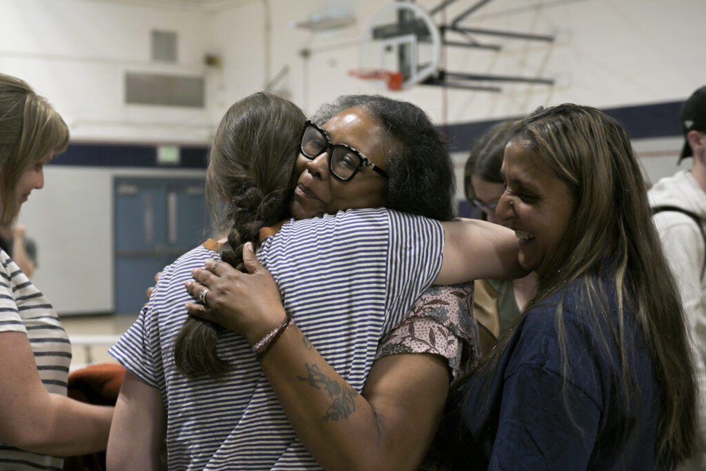 women hugging