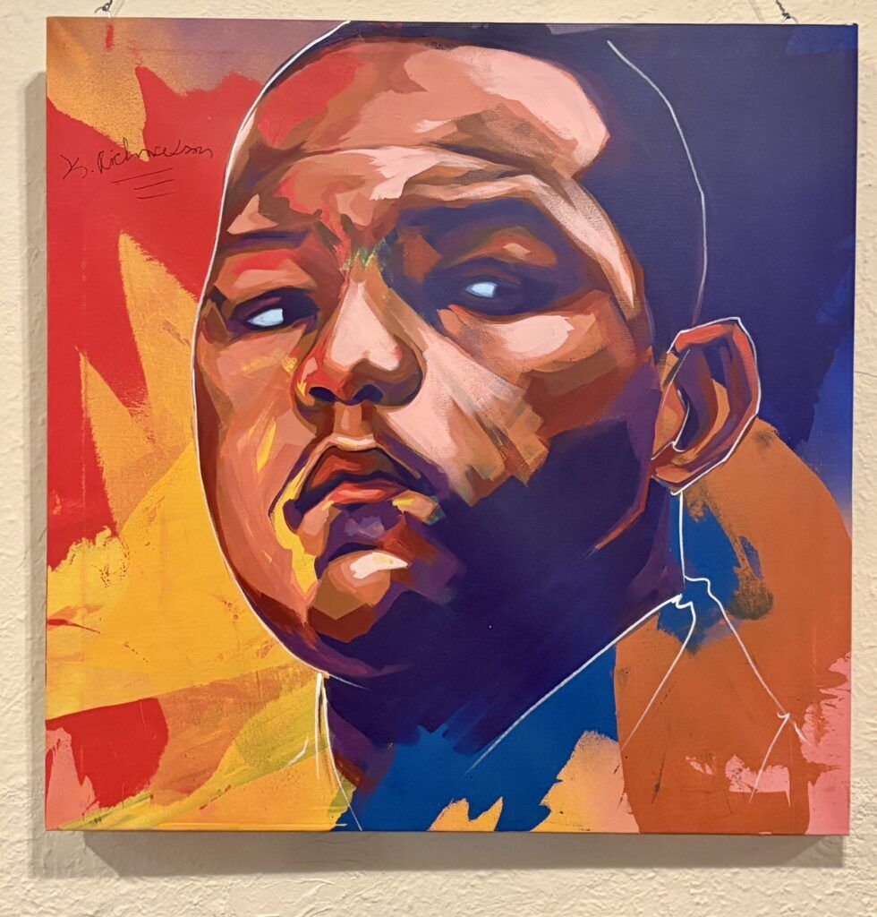 Portraits of the Exonerated Five by Denver artist Detour are hanging at the Denver Press Club for the next month. (John Moore/Denver Gazette)