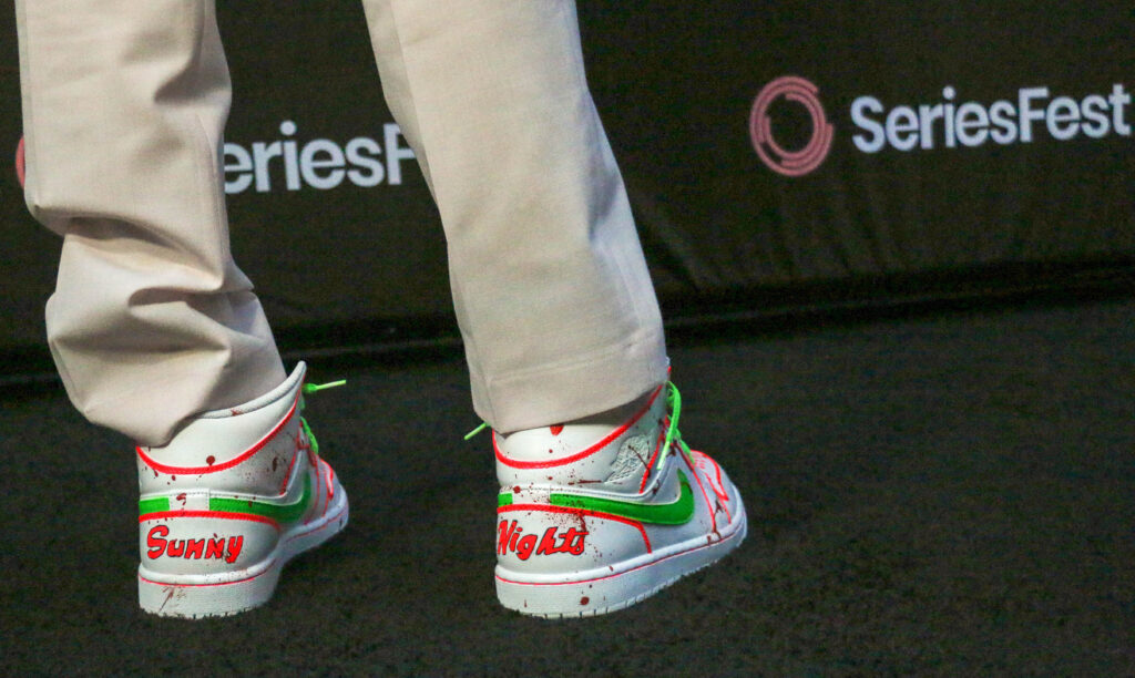 The team from 'Sunny Nights' brought their good-luck, spray-tanned tennis shoes to 2025 SeriesFest. D'arcy Carden, co-star of the Hulu comedy series, will be back in Denver on May 8 to accept the Excellence in Acting Award. (John Moore/Denver Gazette)