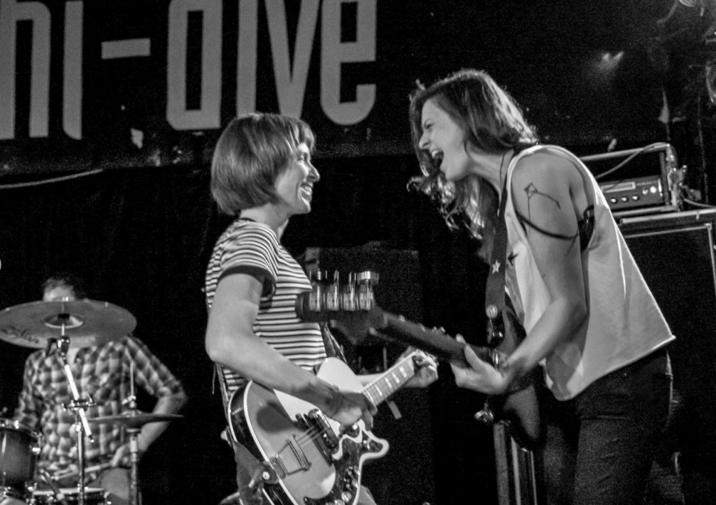 Erin Roberts of Porlolo and Anna Morsett of The Still Tide play at the 2017 Underground Music Showcase. A new Colorado bill would allow individual artists and bands to form corporations. (John Moore/The Denver Gazette)