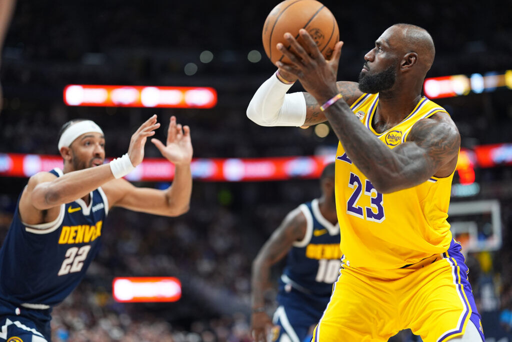 Los Angeles Lakers star LeBron James shoots over Zeke Nnaji in the first quarter of Thursday's game at Ball Arena.