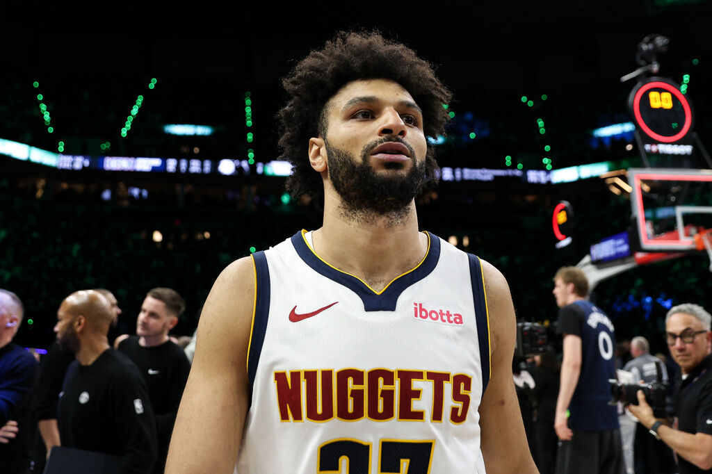Denver Nuggets guard Jamal Murray (27) walks off the court after the Nuggets lost to the Minnesota Timberwolves in Game 6 of a first-round NBA basketball playoffs series, Thursday, April 30, 2026, in Minneapolis. (AP Photo/Matt Krohn)