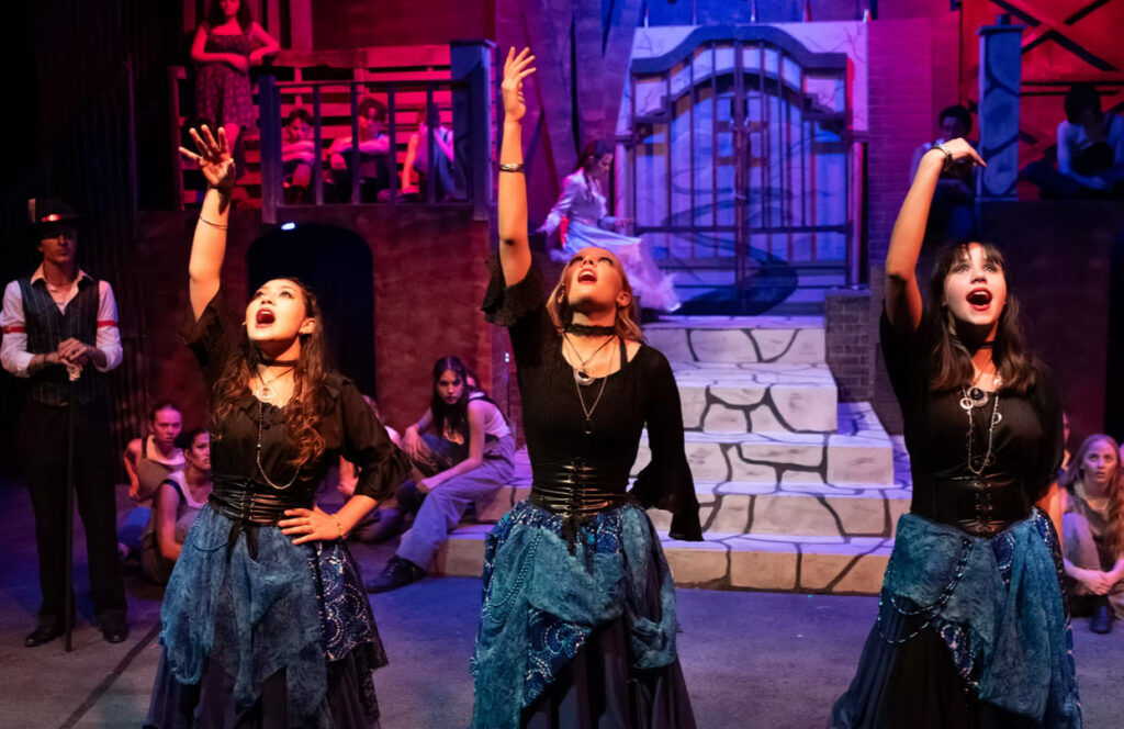 StageDoor Theatre in Conifer maintains three companies of youth actors. The high-schoolers here perform in "Hadestown." (Courtesy StageDoor)