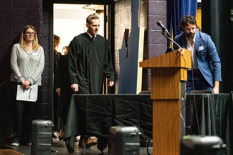 Colorado Court of Appeals Judge Grant T. Sullivan walks into the auditorium for oral arguments at Fort Lupton High School on Tuesday, April 2, 2024 in Fort Lupton, Colorado. The Colorado Court of Appeals and Supreme Court hold "Courts in the Community" events for students to learn about the justice system and hear real cases. Rebecca Slezak, Denver Gazette.
