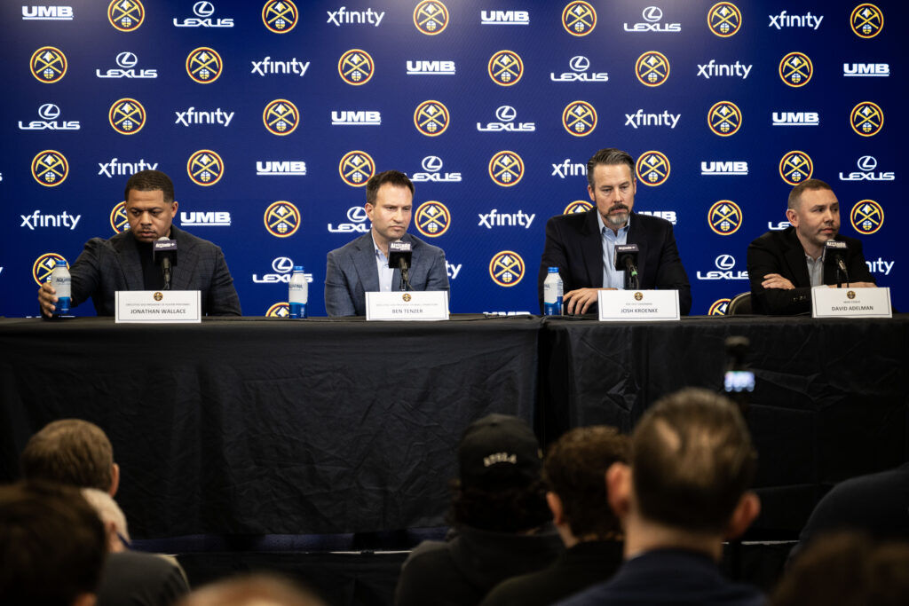 (From left) Jonathan Wallace, Executive Vice President of Player Personnel, Ben Tenzer, Executive Vice President of Basketball Operations, Josh Kroenke, Vice Chairman of KSE, and Nuggets Head Coach David Adelman answer questions from the media during an end of season press conference at Ball Arena on Friday, May 8, 2026. (Stephen Swofford, Denver Gazette)