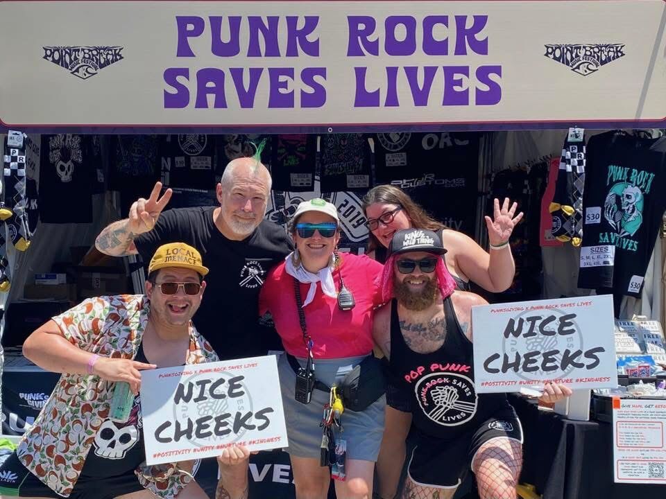 Founder Rob Rushing with some of his volunteers at the Punk Rock Saves Lives booth during a Point Break Music Festival held at the Virginia Beach Oceanfront Boardwalk in Virginia Beach. (Courtesy Punk Rock Saves Lives)