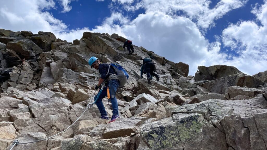 Climbers on the Arapahoe Basin Via Ferrata. Photo: Spencer McKee.
