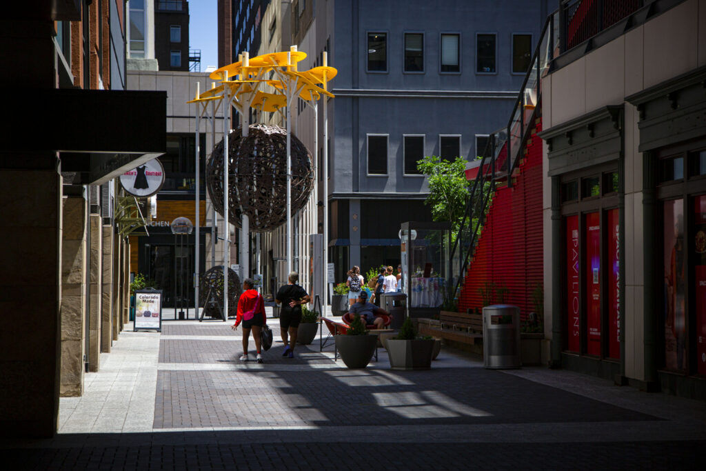 Pedestrians walk around Denver Pavilions in downtown on Friday, June 19, 2026. (Bernadette Berdychowski / The Denver Gazette)