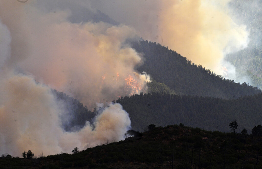 The Aspen Acres fire engulfs a hillside near southeast of Beulah on Monday, June 29, 2026.