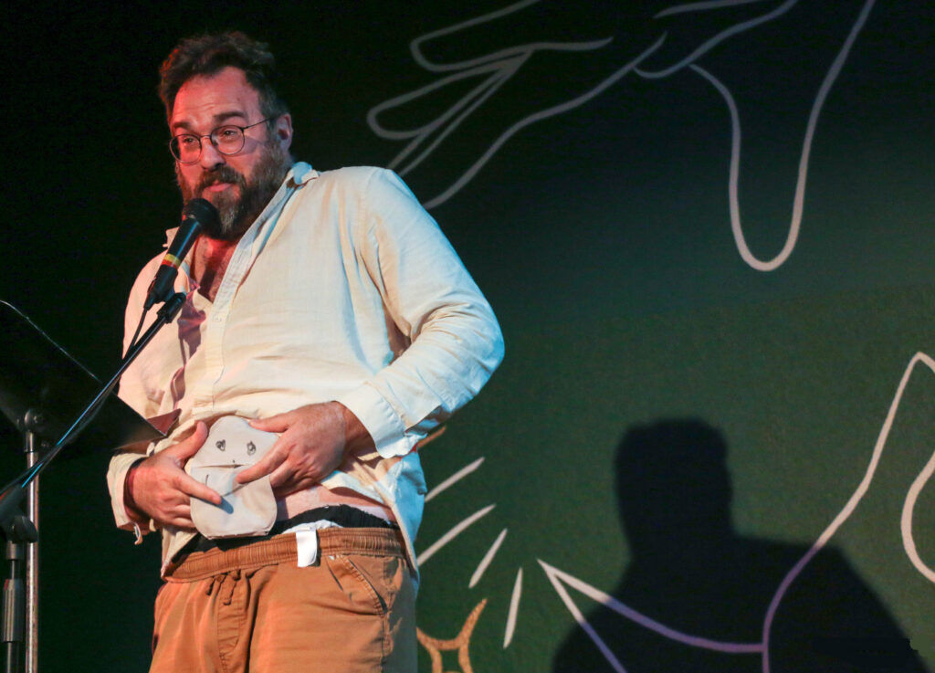 An intentionally unnamed puppeteer performs 'Colostomy Bag Buddies' at the 2025 Denver Fringe festival. (John Moore/Denver Gazette).