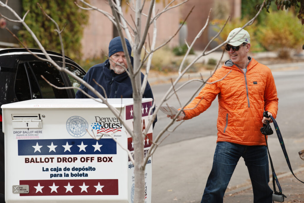 Voters drop their ballots at a polling location in Denver on Monday, Nov. 3, 2025. (Tom Hellauer/Denver Gazette)