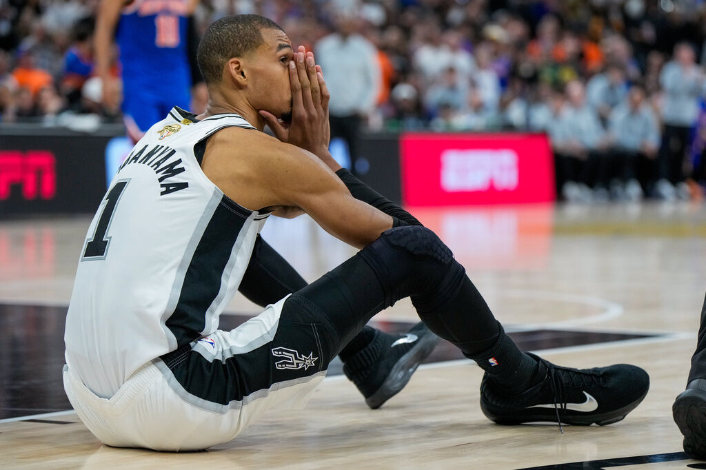 San Antonio Spurs forward Victor Wembanyama reacts after a foul call during the second half of Game 5 of the NBA Finals basketball series against the New York Knicks, Saturday, June 13, 2026, in San Antonio. (AP Photo/Ross D. Franklin)