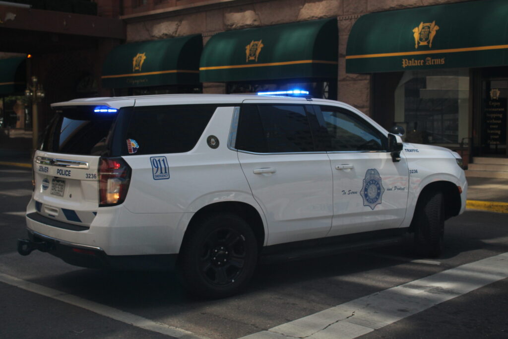 Witnesses lift BMW off woman dragged by hit-and-run driver in downtown Denver