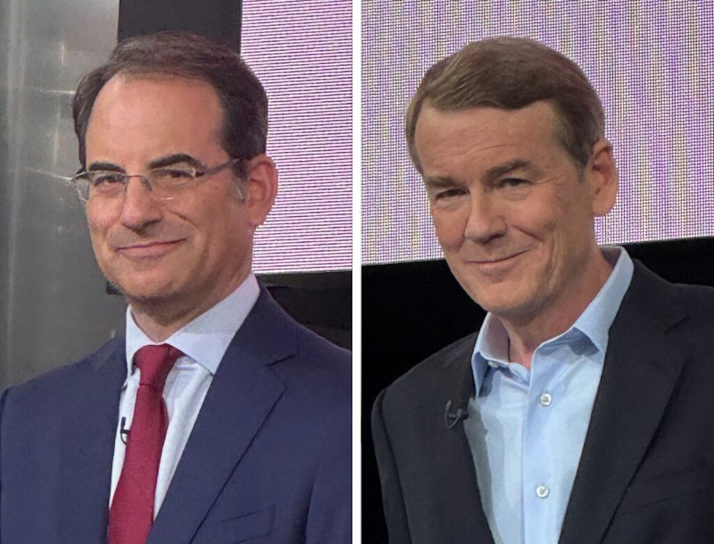 Democratic Colorado gubernatorial candidates, from left, Attorney General Phil Weiser and U.S. Sen. Michael Bennet participate in a debate sponsored by 9News and Colorado Politics on Thursday, June 4, 2026, at the University of Denver in Denver. (Thelma Grimes/Colorado Politics)