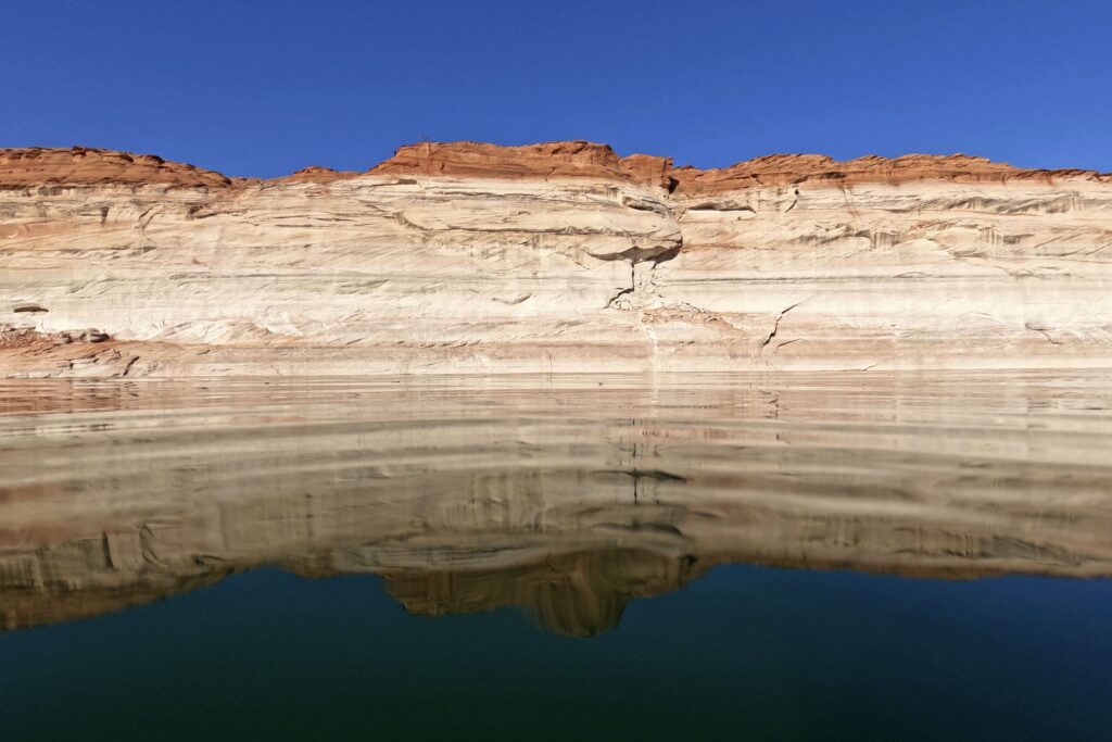 Behind Lake Powell’s low water levels, a canyon is coming back to life