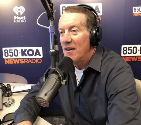 iHeartMedia Denver released this photo in 2019 when Dave Logan agreed to a 10-year contract as the play-by-play announcer for Denver Broncos games on KOA Radio. iHeartMedia Denver)