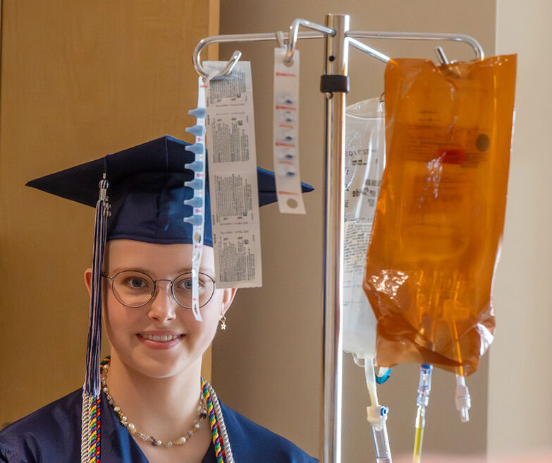 Because Elly Siebert had a treatment for post-leukemia at the same time as her graduation at Air Academy High School, the staff at Children’s Hospital gave her a graduation in the hallways of the hospital on Thursday, May 14, 2026. Her oncologist presented her with her diploma. Siebert played volleyball for Air Academy and hopes to be playing at Colorado College. (The Gazette, Jerilee Bennett)