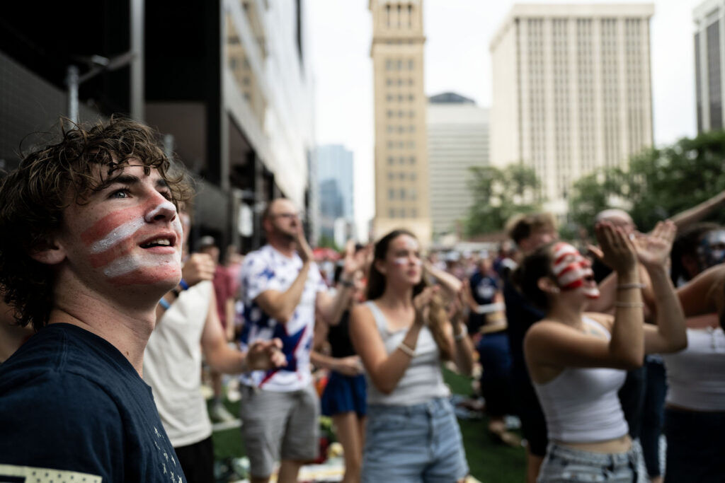 Owen Davidson, 14, and his friends celebrate a USA goal during a watch party for the USA vs Bosnia-Herzegovina game at Skyline Park on Wednesday, July 1, 2026.
