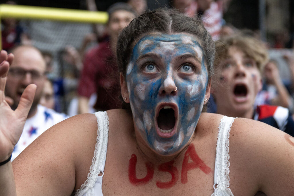 Kezi Davidson reacts as the USA scores their first goal during a watch party for the USA vs Bosnia-Herzegovina game at Skyline Park on Wednesday, July 1, 2026.