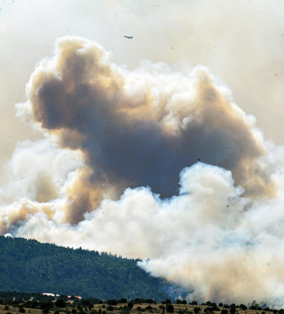 The Aspen Acres Fire heads south over the mountains near Colorado City causing the town to be evacuated on Wednesday, July 1, 2026. (The Gazette, Jerilee Bennett)
