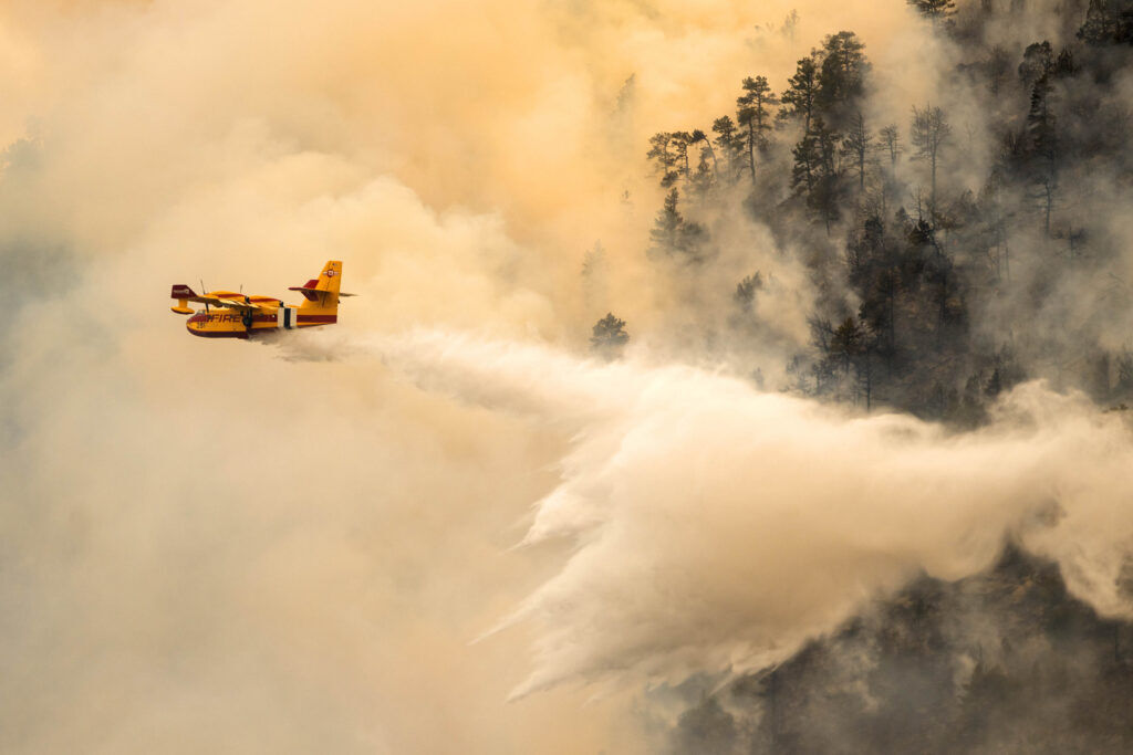 A Super-Scooper plane drops a load of water on the southeast corner of the Aspen Acres fire near Colorado City on Friday, July 3, 2026. (The Gazette, Michael G. Seamans)