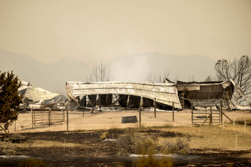 A structure destroyed by the Aspen Acres fire