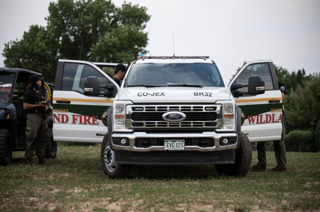 Woodland Firefighters wait on standby at Clement Park before the start of a fireworks show as park of the park’s annual Red White and You celebration on Friday, July 3, 2026.