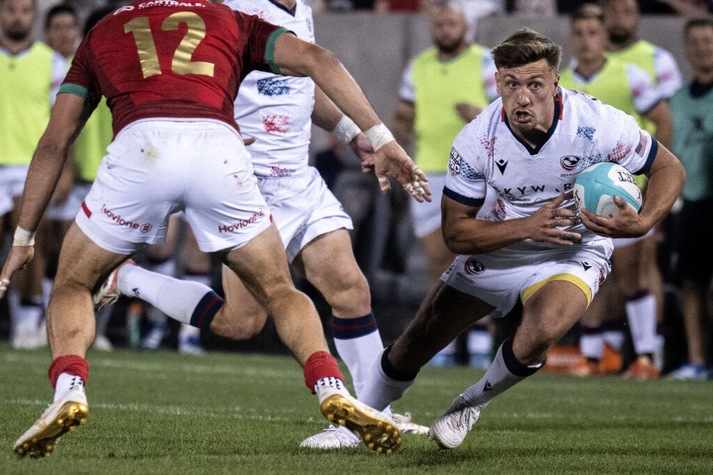 USA Winger Perry Mayo dodges past the Portugal defense during the USA vs Portugal game at the Rugby World Nations Cup at Dicks Sporting Goods Park on Saturday, July 4, 2026.