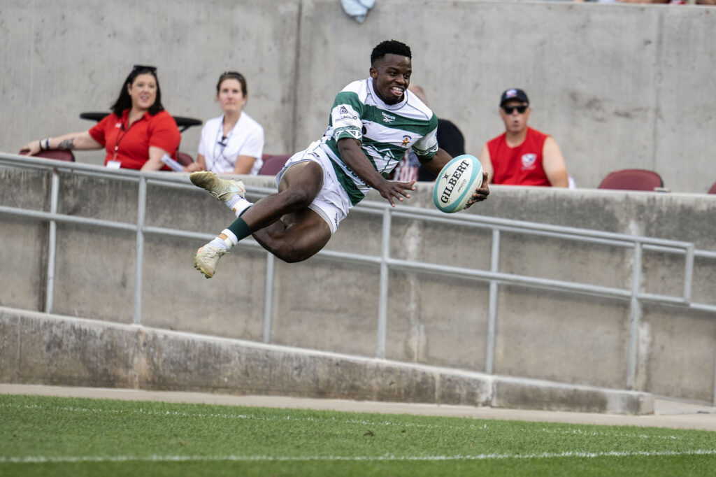Zimbabwe Winger Edward Sigasuke dives over the line for Zimbabwe’s fourth try during the second half of Tonga vs Zimbabwe at the Rugby World Nations Cup at Dicks Sporting Goods Park on Saturday, July 4, 2026. Tonga won 36-24.
