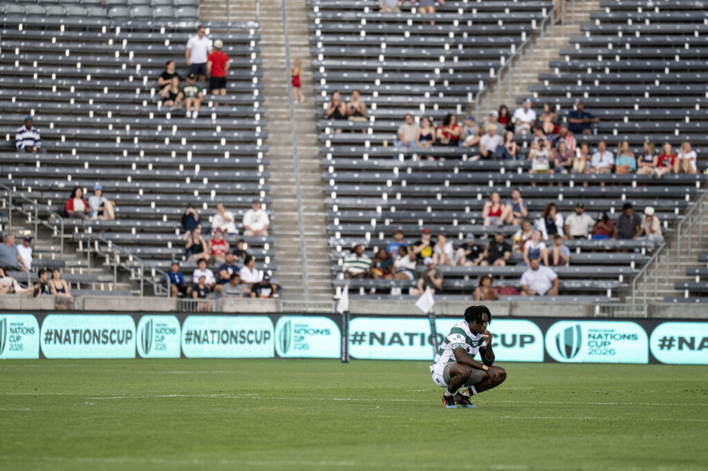 A Zimbabwe player crouches on the pitch after final time is called during the Tonga vs Zimbabwe at the Rugby World Nations Cup at Dicks Sporting Goods Park on Saturday, July 4, 2026. Tonga won 36-24.