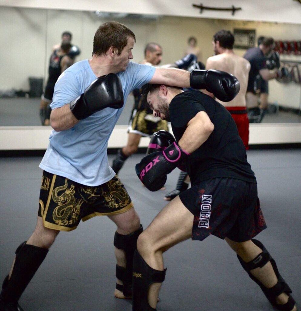 Local real estate agent and general manager of South Academy Boulevard's Crunch Fitness, Diego Rhon, trains at OCC Fight House for his July 10 fighting debut at Westminster’s Rodeo Convention Center. (April Borjon/The Gazette)