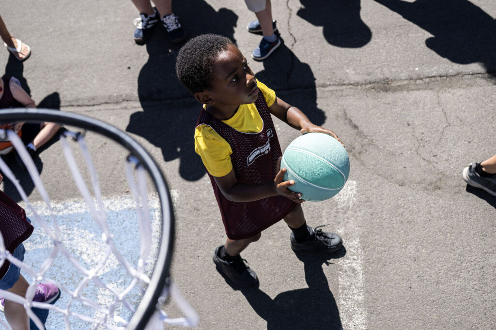 Howard Horton, 5, shoots hoops during a Youth Sports Day clinic for special olympics young athletes on Friday, July 10, 2026. Athletes learned basketball, street hockey, soccer, lacrosse, and dance during the event.