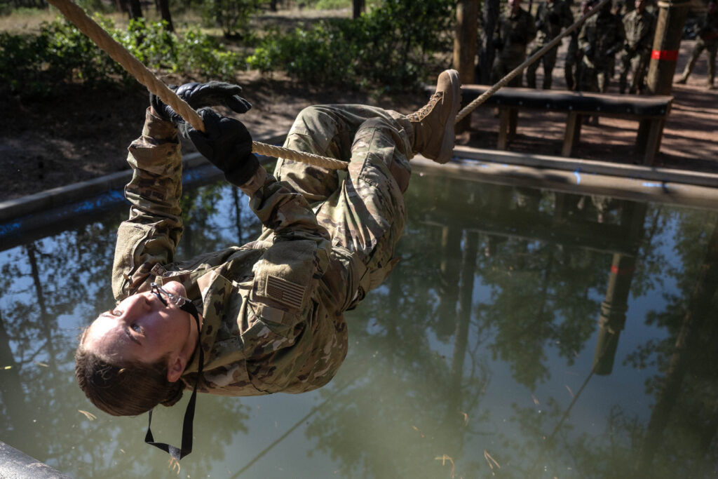 A basic cadet climbs the rope bridge over the water hazard during Basic Cadet Training at the U.S. Air Force Academy in Colorado Springs on Thursday, July 16, 2026. (The Gazette, Michael G. Seamans)