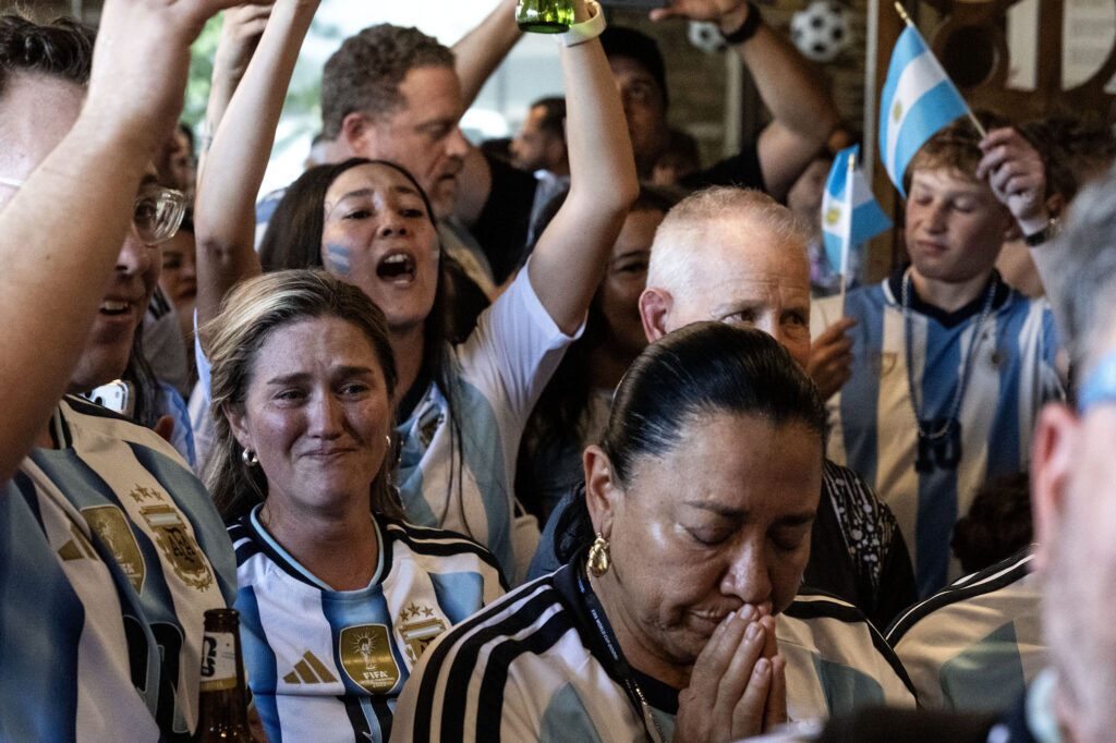 Fans get emotional during the Argentina national anthem during a watch party at Maria Empanada on South Broadway for the Argentina vs England World Cup semifinals on Wednesday, July 15, 2026.